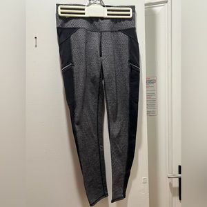 NWOT XS ATHLETA LEGGINGS… TWO TONED, BLACK AND GRAY WITH ZIPPERS ON THE SIDE…
